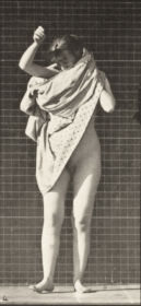 Plate 425 Toilet, putting on a dress and turning around — figure reference